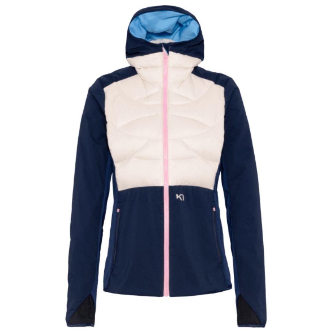 Kari Traa Tirill Thermal Jacket on lämmin ja tekninen naisten hybriditakki, joka on suunniteltu ulkoiluun, hiihtoon ja vaihteleviin sääolosuhteisiin. Takissa yhdistyvät tehokas ankanuntuvatäyte, lämpöä lisäävä vanutäyte sekä tuulenpitävä materiaali alueilla, jotka joutuvat eniten sään armoille. Näin lämpö pysyy siellä, missä sitä tarvitaan, mutta rakenne antaa keholle tilaa säädellä lämpöä liikkeen aikana.