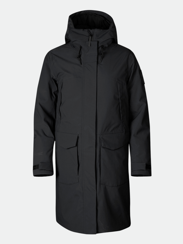 Halti Bergga W Warm DX Parka on naisten pitkä talviparka, jossa yhdistyvät lämmin eristys, sääsuoja ja ajaton kaupunkityyli. Musta Halti Bergga talvitakki sopii työmatkoille, päivittäiseen käyttöön ja talven ulkoiluun, kun tarvitset suojaa kylmältä, tuulelta ja sateelta.