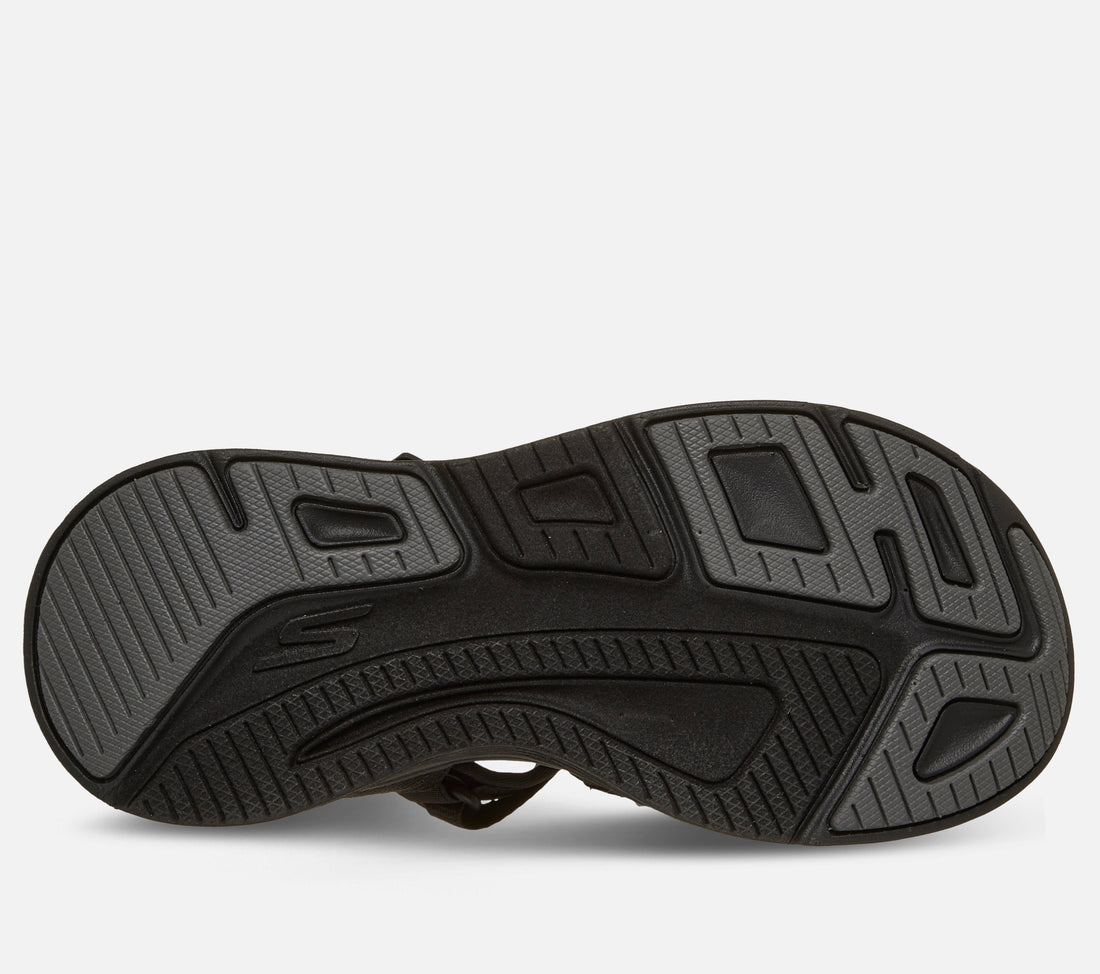 Skechers Slip Ins Max Cushioning Elite 2.0 Sandal Zoe on naisten sandaali, jossa yhdistyvät erittäin pehmeä Max Cushioning mukavuus, helppo pukeminen ja jalkaterää tukeva rakenne. Tämä Skechers sandaali on suunniteltu erityisesti kesäiseen kävelyyn, vapaa aikaan ja jokapäiväiseen käyttöön, kun kengältä halutaan keveyttä ja tehokasta vaimennusta.